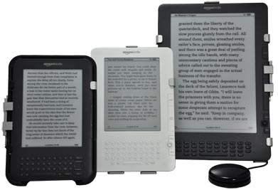 Photo of Kindle 2, Kindle DX and Kindle 3 each mounted in an Origin Instruments' PageBot.